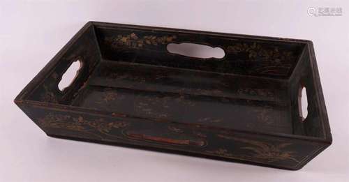 A black lacquered metal tray and wooden mangle tray, 19th C.