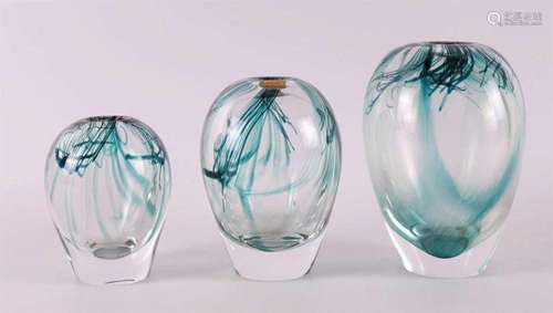 Three thick-walled glass serica vases with green glass threa...