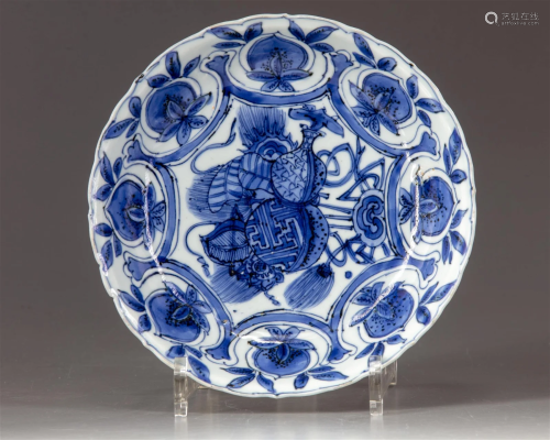 A CHINESE BLUE AND WHITE SCALLOPED RIM DISH