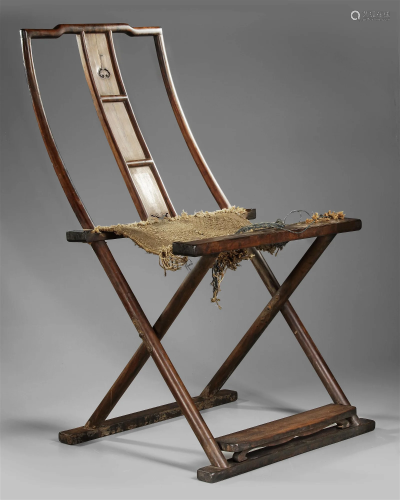 A FINE AND RARE HUANGHUALI FOLDING CHAIR, CHINA 17TH CENTURY