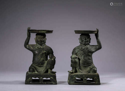 Pair of Bronze Figure Candlesticks