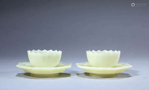 Pair of Incised Jade Plantain Tea Cups and Saucers