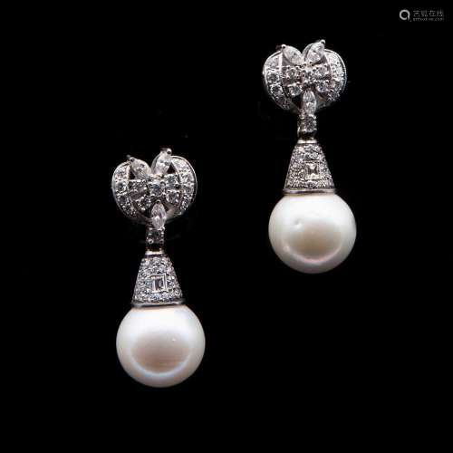 White gold earrings with diamonds and South Sea pearls