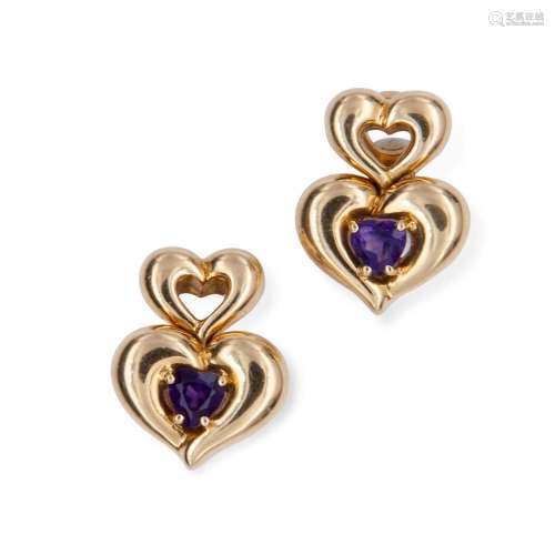 Double heart-shaped earrings made of yellow gold and amethys...