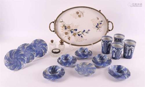 A lot of miscellaneous items, including cups and saucers and...