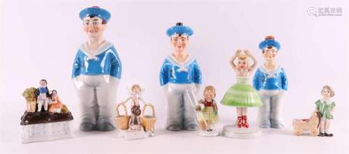 Nine various polychrome porcelain figurines, including mid 2...