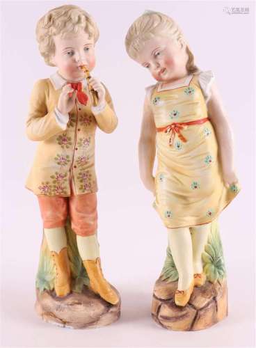 A biscuit porcelain boy and girl, Germany, circa 1900.