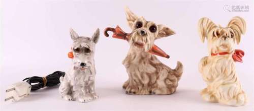 Three various porcelain scented lamps in the shape of dogs, ...