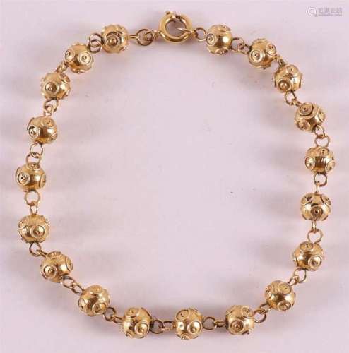 A gold plated 800/1000 silver ball bracelet.