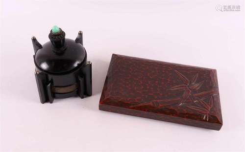 A black bakelite Art Deco tobacco box, ca. 1920.