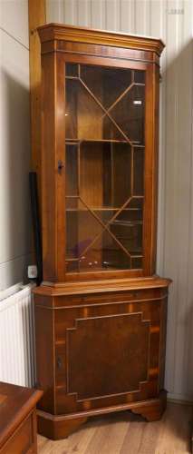 A two-door corner cabinet after an antique example, England ...