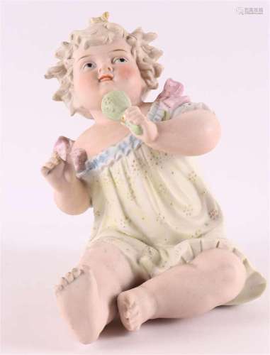 A polychrome biscuit porcelain sitting baby, Germany, early ...