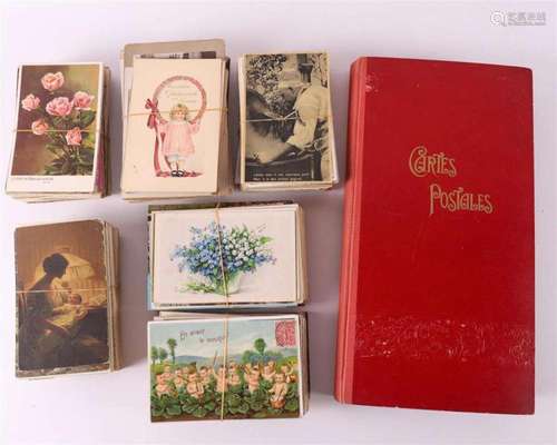 An album with fantasy postcards + approx. 600 loose cards, f...