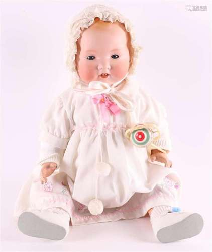 A baby doll with porcelain head, Germany, A & M351, circ...