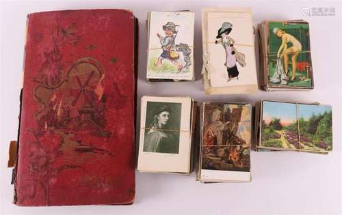 An album with fantasy postcards + approx. 600 loose cards, f...