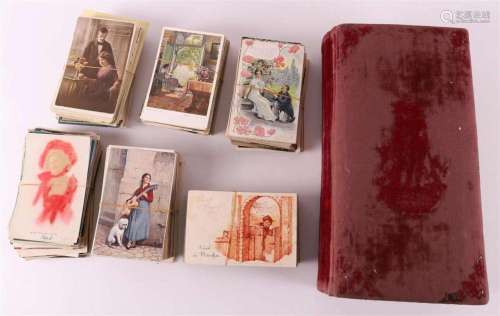 An album with fantasy postcards + approx. 600 loose cards, f...