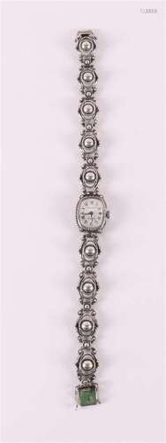 A second grade silver ladies wristwatch with link strap.