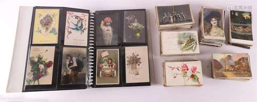 An album with fantasy postcards + approx. 600 loose cards, f...