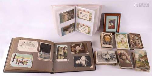 Two albums with fantasy postcards + approx. 600 loose cards,...