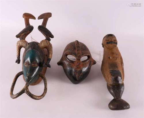 A lot of various ethnographics, including mask, Africa.