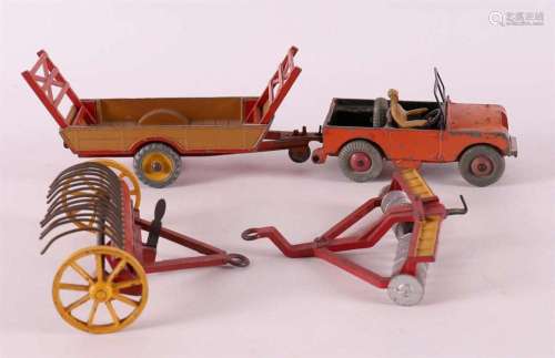 A Dinky Toys land rover + three ditto agricultural tools, ma...