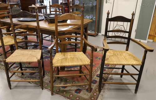 A lot of various vase knob chairs with rush seats.