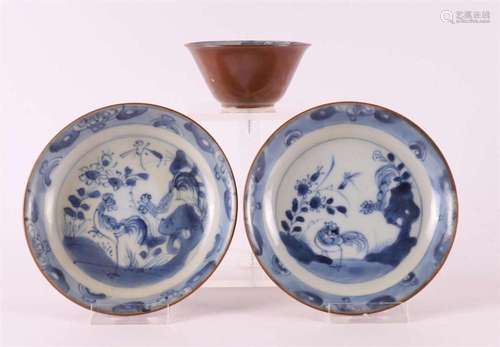 A blue and white porcelain cup and two saucers, China, Qianl...