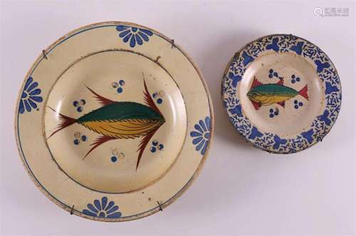 Three various earthenware dishes, including 18th century.