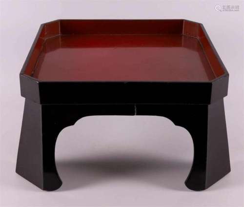 A black/red lacquer table, Japan, 19th century.