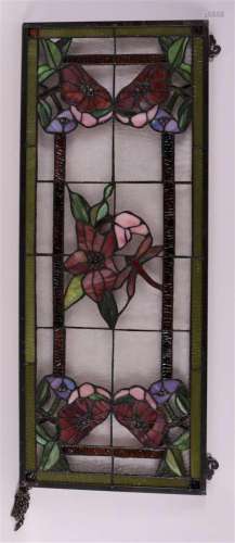A stained glass window with floral decor and dragonfly, 2nd ...
