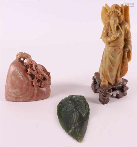 Two soapstone figures of i.a. immortal, China, around 1900.
