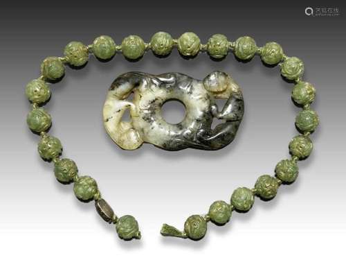 A JADE DISC WITH MYTHICAL BEASTS & A CARVED JADE NECKLAC...