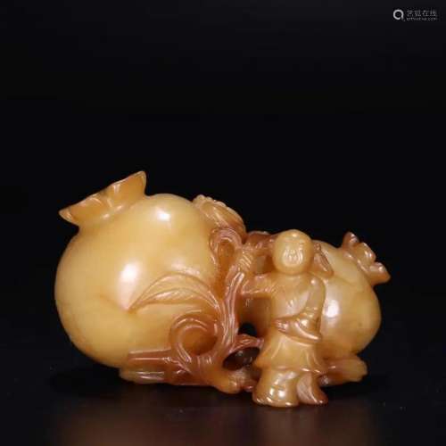 JADE CARVING OF KID AND POMEGRANATE