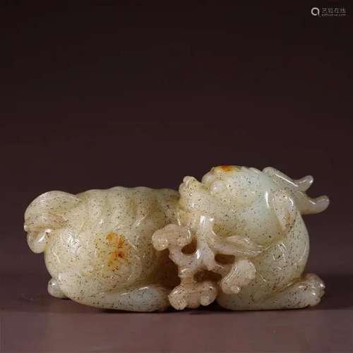 RUSSET JADE CARVING OF RECUMBENT KYLIN