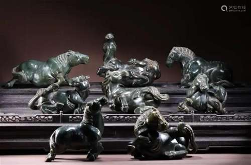 A SET OF SPINACH JADE CARVING OF EIGHT HORSES