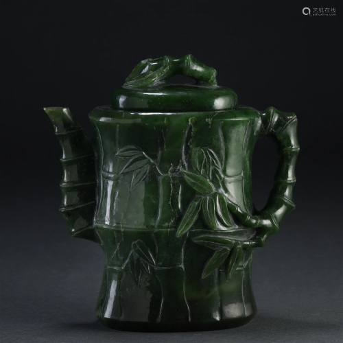 A Chinese Carved Jasper Ewer and Cover