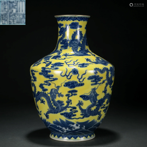 A Chinese Yellow Ground and Underglaze Blue Zun Vase Qing Dy...