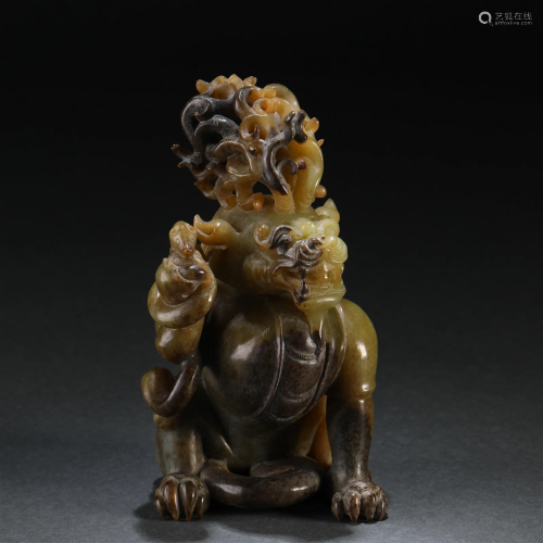 A Chinese Carved Russet Jade Beast