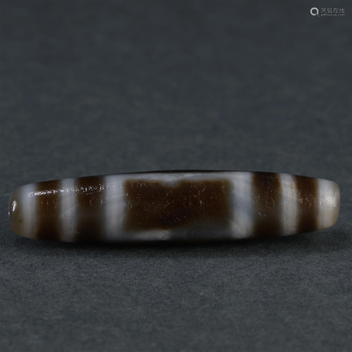 A Tibetan Dzi Bead