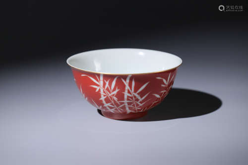 大清乾隆年制礬紅留白竹紋碗
