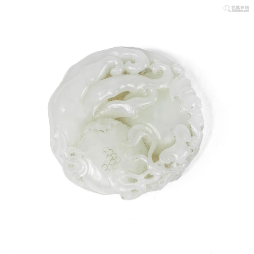 A WHITE JADE CARVING OF AUSPICIOUS FRUITS 20th century