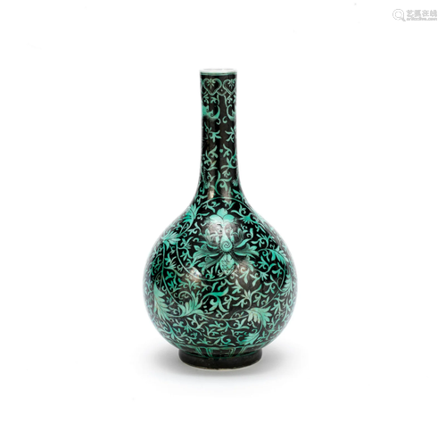 A BLACK GROUND GREEN-ENAMELLED BOTTLE VASE 19th century