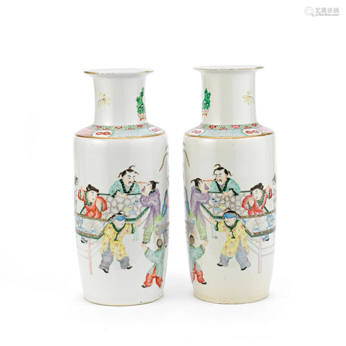 A PAIR OF MIRROR-IMAGE FAMILLE ROSE ROULEAU VASES Qianlong i...