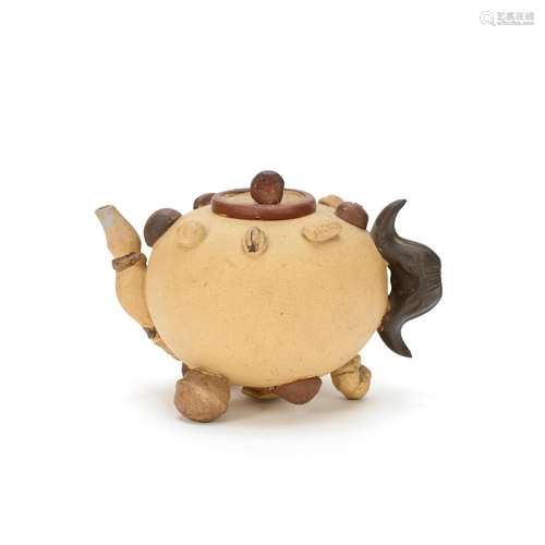 AN YIXING 'HUNDRED-FRUIT' TEAPOT AND COVER Late Qi...