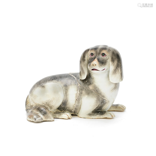 AN ENAMELLED PORCELAIN MODEL OF A RECUMBENT SPANIEL Qianlong