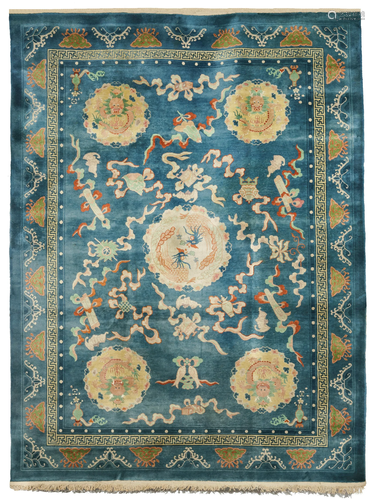 A LARGE 'DRAGON AND PHOENIX' WOOL CARPET Early 20t...