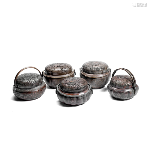 A GROUP OF FIVE COPPER ALLOY HAND WARMERS AND COVERS 19th ce...