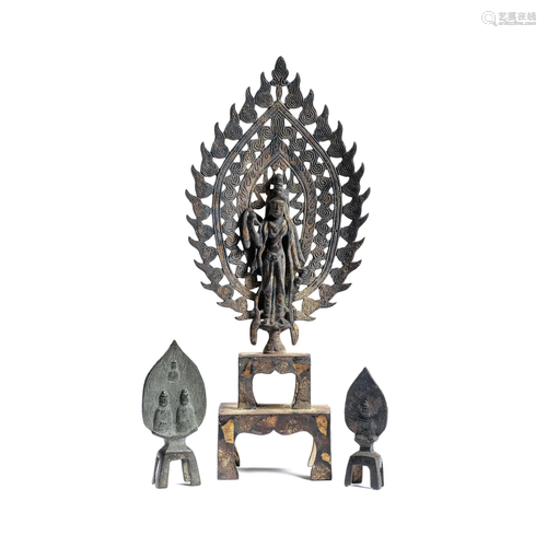 THREE BRONZE FIGURES OF DEITIES Northern Wei Dynasty and lat...