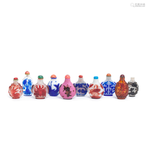 TEN CARVED OVERLAY GLASS SNUFF BOTTLES 19th/early 20th centu...