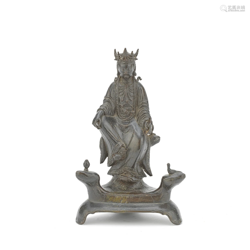 A BRONZE FIGURE OF GUANYIN Ming Dynasty or earlier